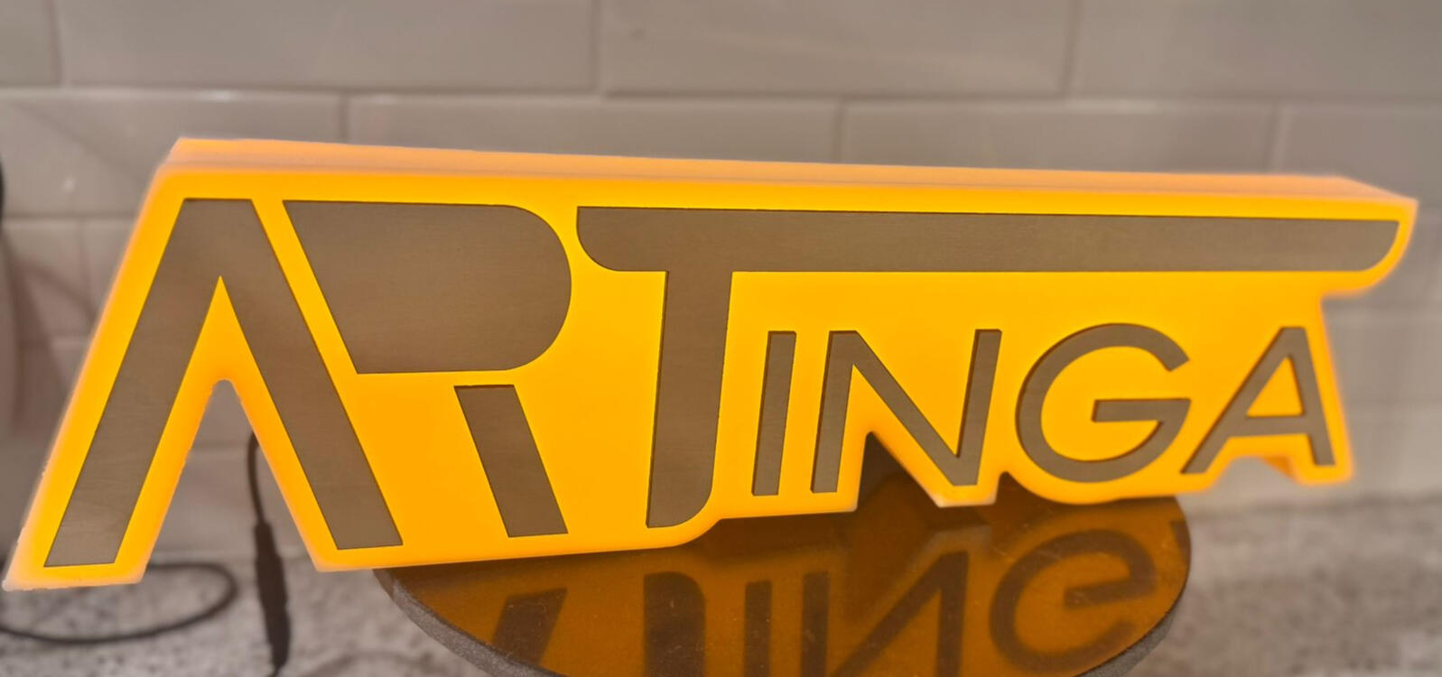 Artinga logo illuminated